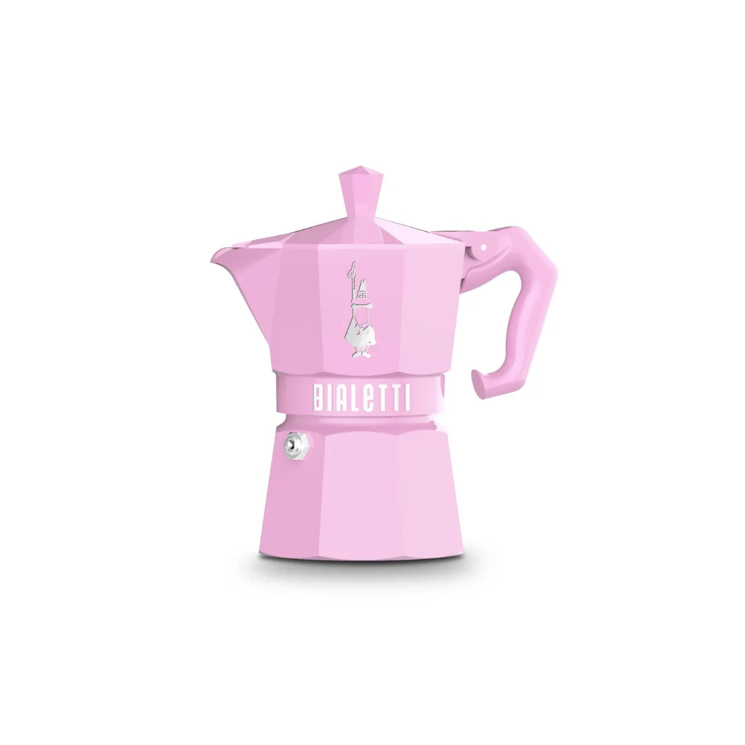Cafetera moka Bialetti rosa, con asa lateral y tapa superior.