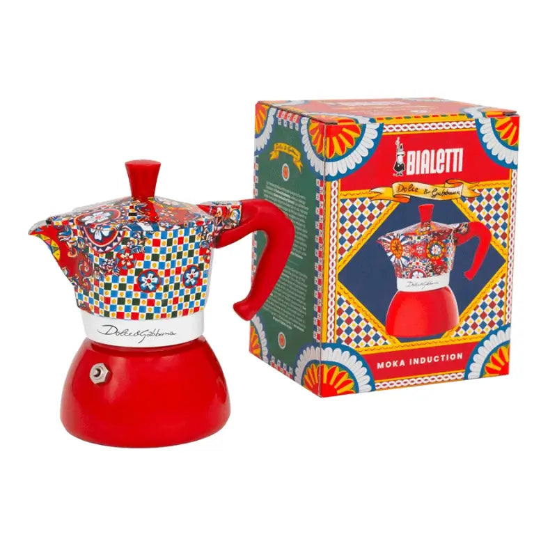 Cafetera moka roja de inducción con diseño multicolor y caja Bialetti Dolce&Gabbana
