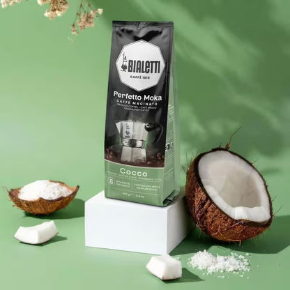 Bolsa de café molido Bialetti Perfetto Moka Coco con cocos alrededor