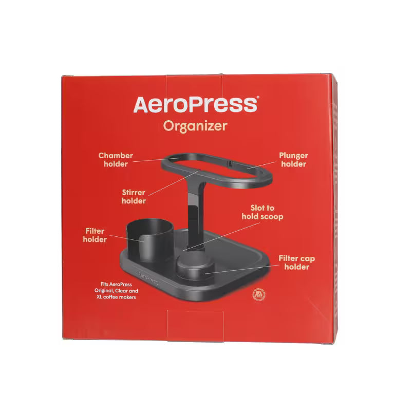 Caja roja del organizador Aeropress con vista del soporte negro y compartimentos