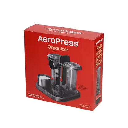 Caja roja del organizador Aeropress con imagen del soporte negro y accesorios